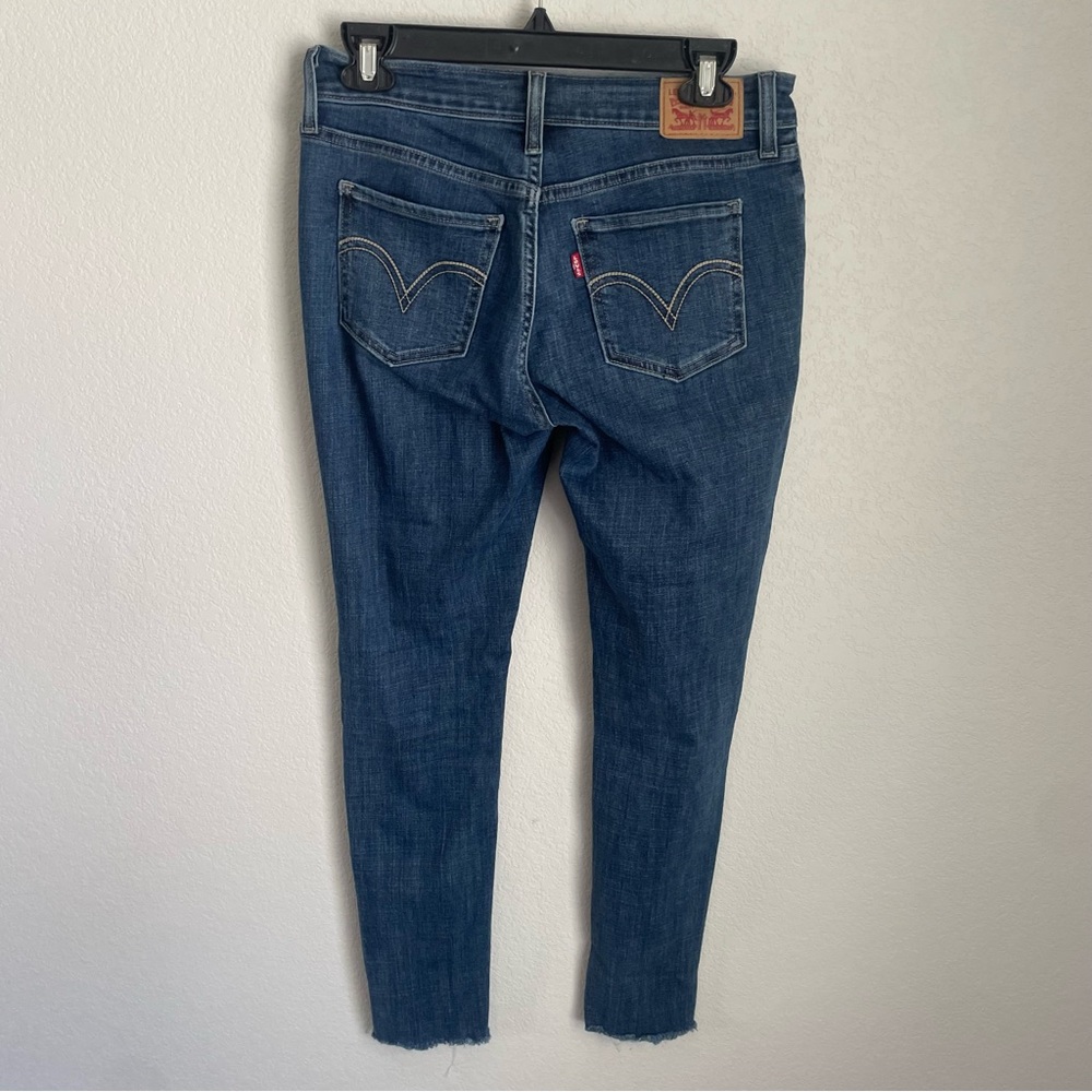 Levi’s Super Skinny Jeans Women’s Size 28 Distressed Raw Hem Medium Wash Denim - Picture 7 of 10